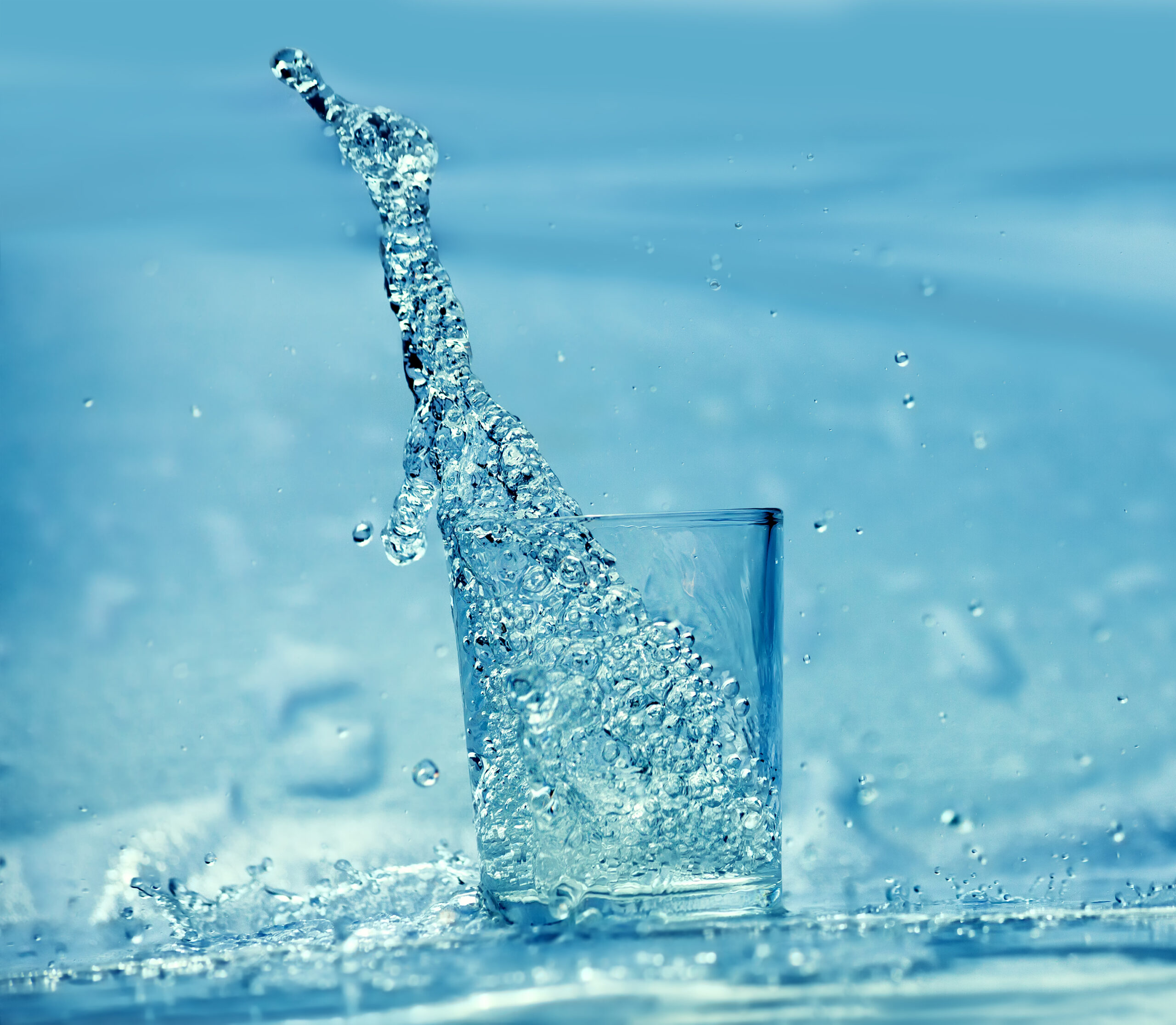 cup of water spilling
